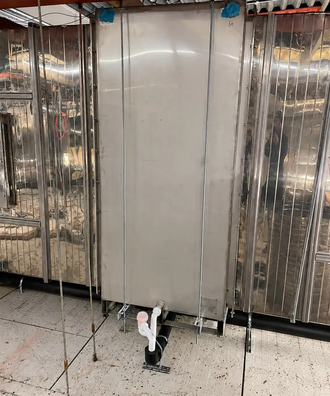 Heat recovery equipment retrofitted in an existing facility